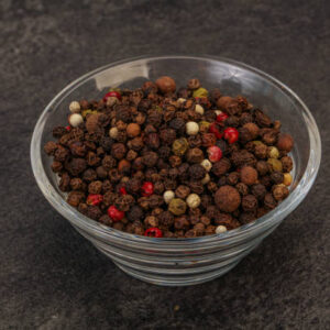 Various peppercorn heap in the bowl