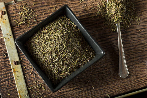 Raw organic dried thyme in a bowl